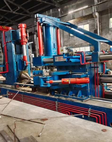 Heavy-duty ring rolling machine in an industrial manufacturing plant
