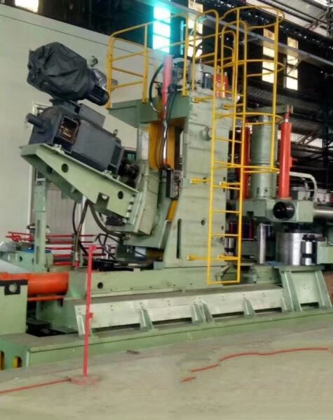 Industrial ring rolling equipment in a metal manufacturing facility